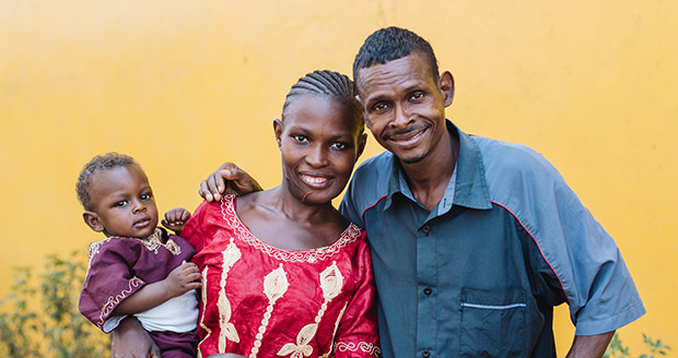 Isatu with her husband and child after her successful surgery